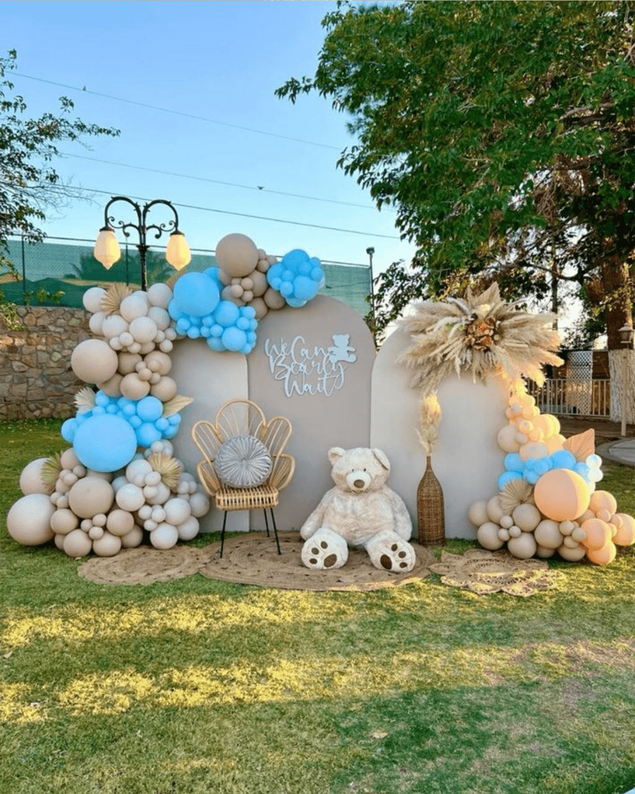 Soft pastel balloon backdrop styled for a baby shower